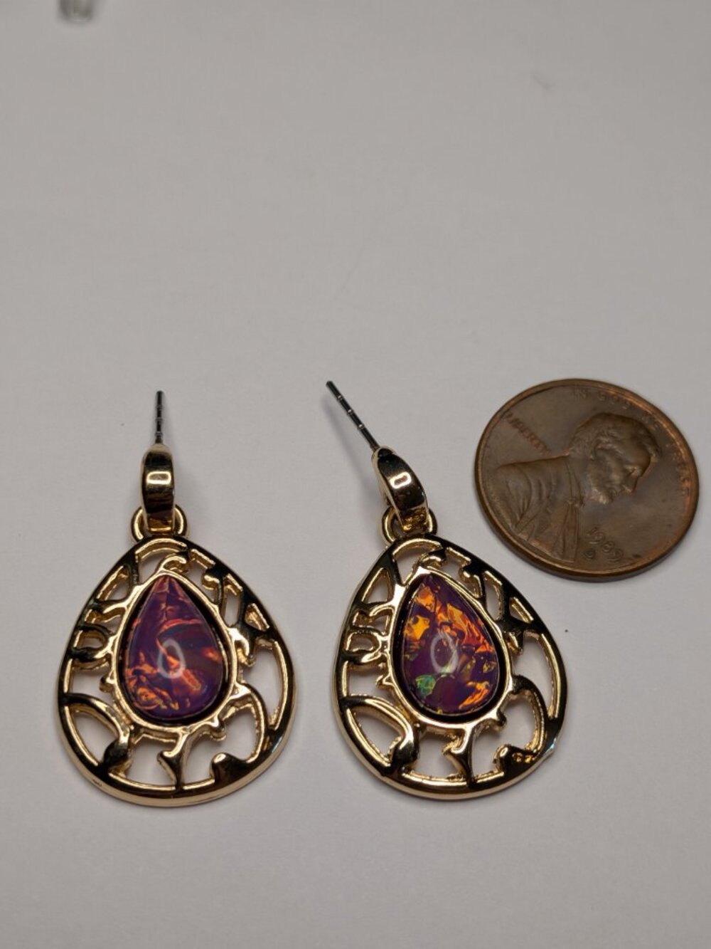 Gold‑Tone Teardrop Dangle Earrings with Opal‑Look Cabochons